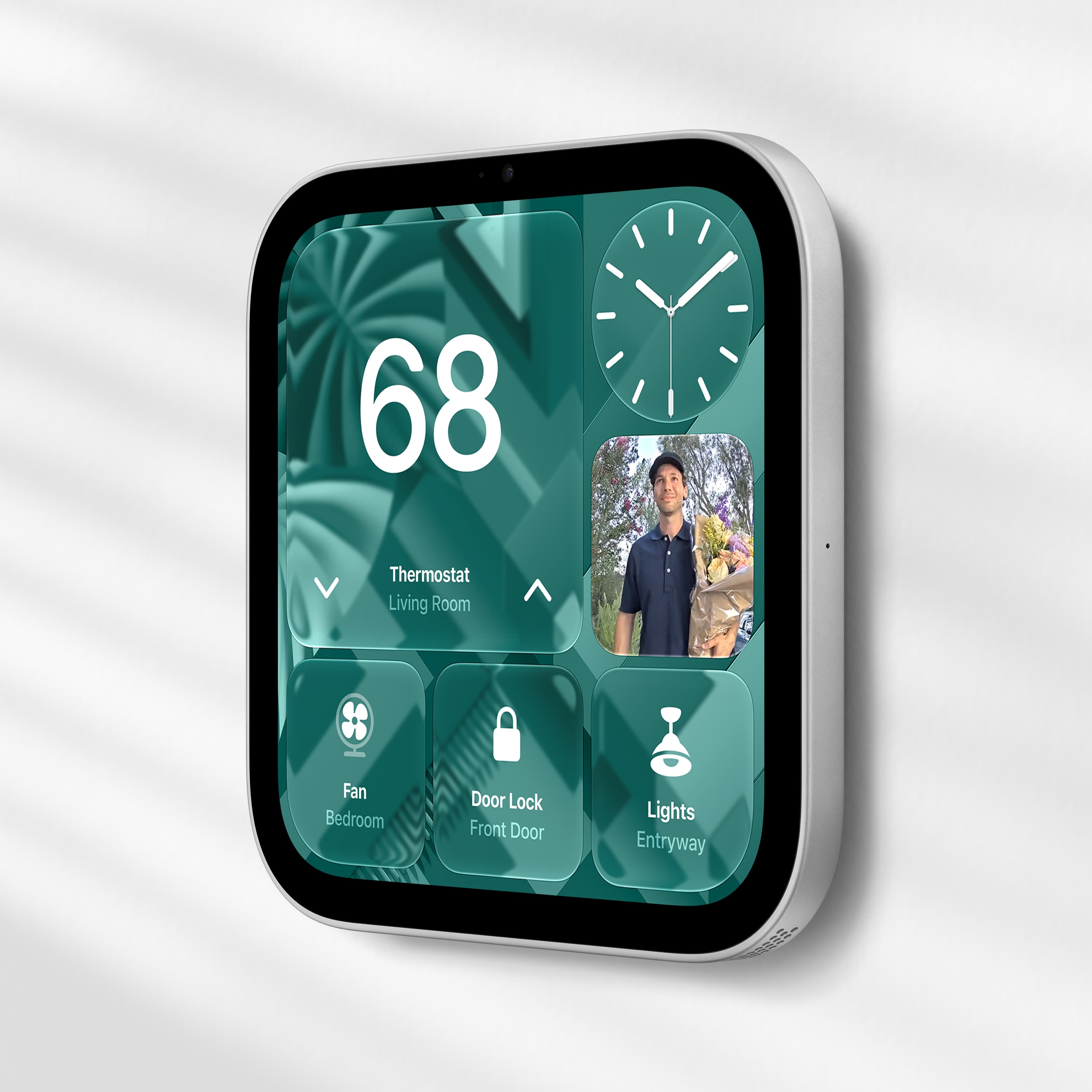 The wall-mounted HomeView has no speaker base, and Apple shows it as a home control panel: thermostat, front door camera, lock, fan and lights on one screen. Image: Apple Newsroom.